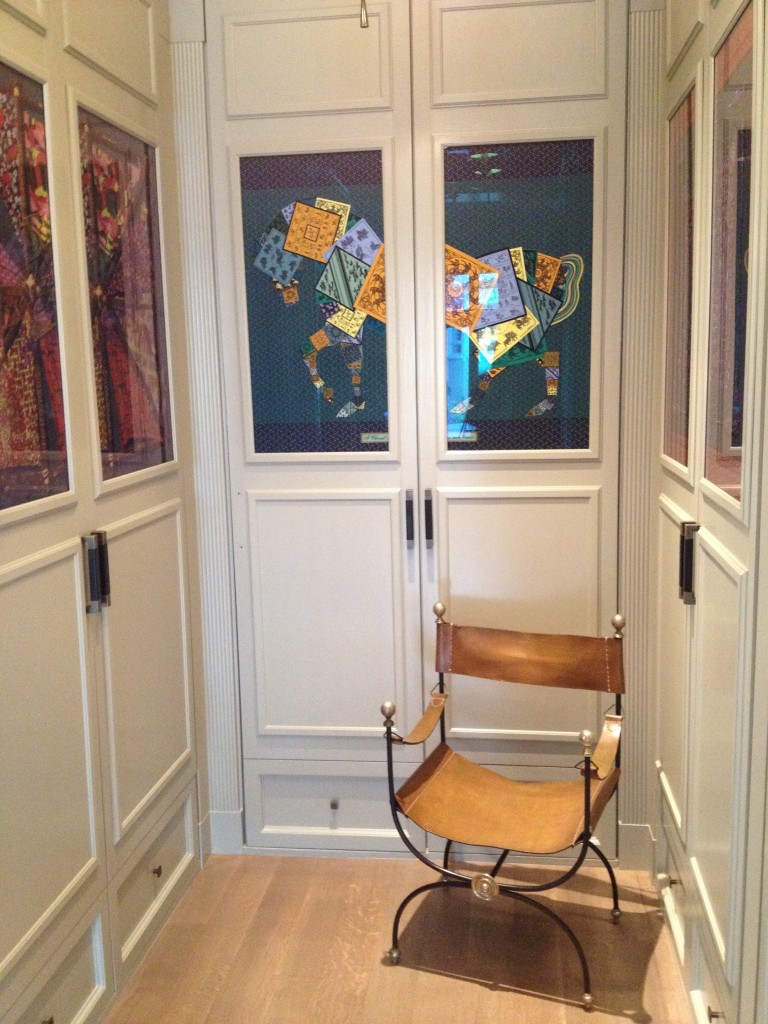 Hermes Scarves in glass front cabinets