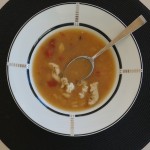 Parsi Chicken Soup with Rice served in bowl by Swid Powell